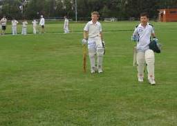 William Blair (left) and William D'Amico walk off Ormond Park after hitting the winning runs.